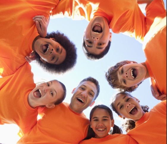 group hundle with orange t shirts
